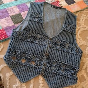 Vintage denim vest, criss/cross braided w flowers, large